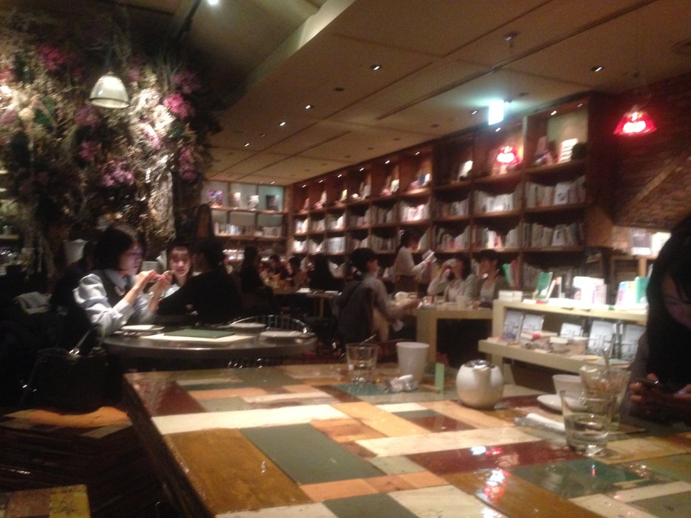 Book cases around dining room at Brooklyn Parlor Cafe in Tokyo.JPG